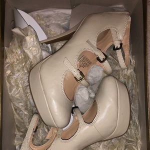 LC Lauren Conrad cream high heels.